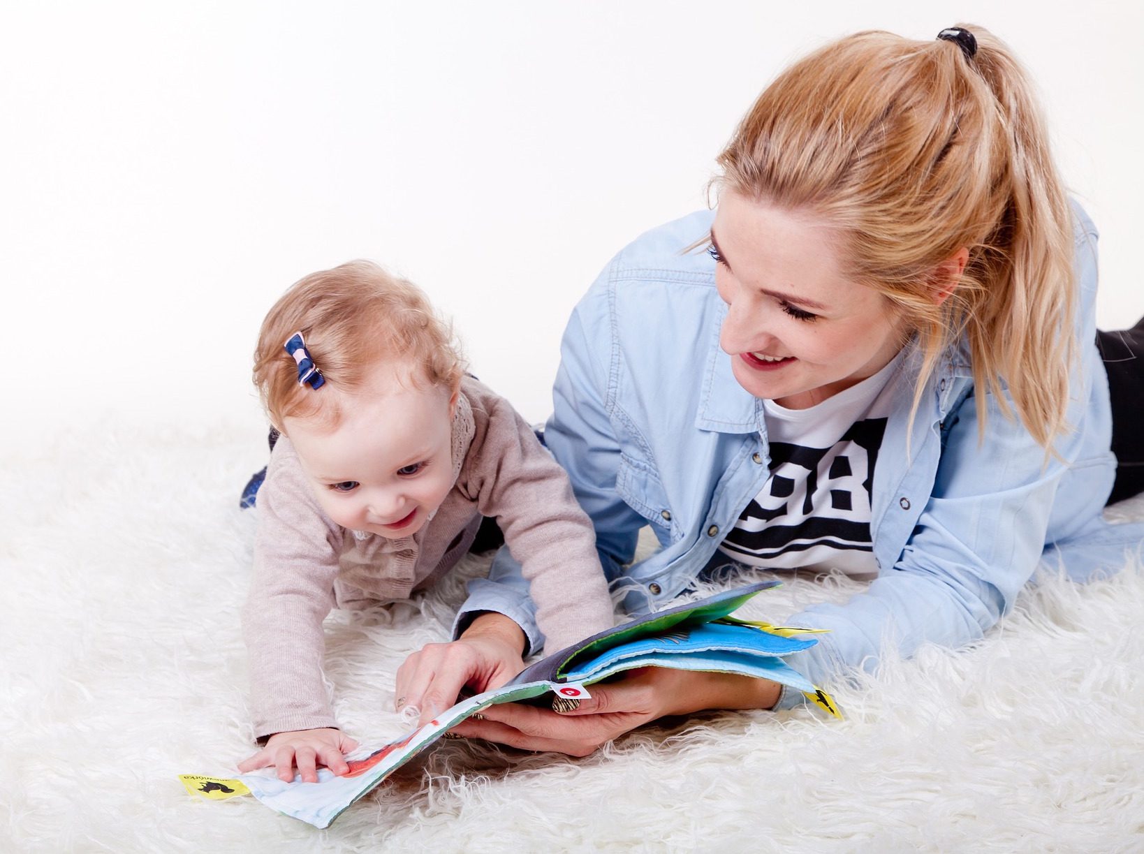 Infant to Preschool daycare. Image of a child reading a story